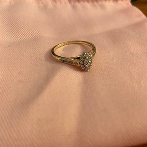 10k Yellow and White Gold 1/8 tw Marquise ring